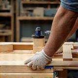 Craftsman assembling a custom cabinet